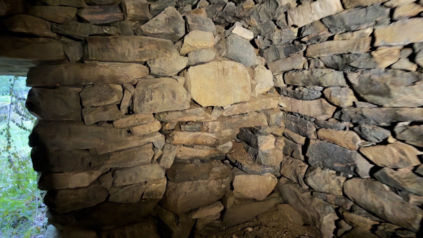 Interior of a root cellar built of carefully laid dry-stone masonry